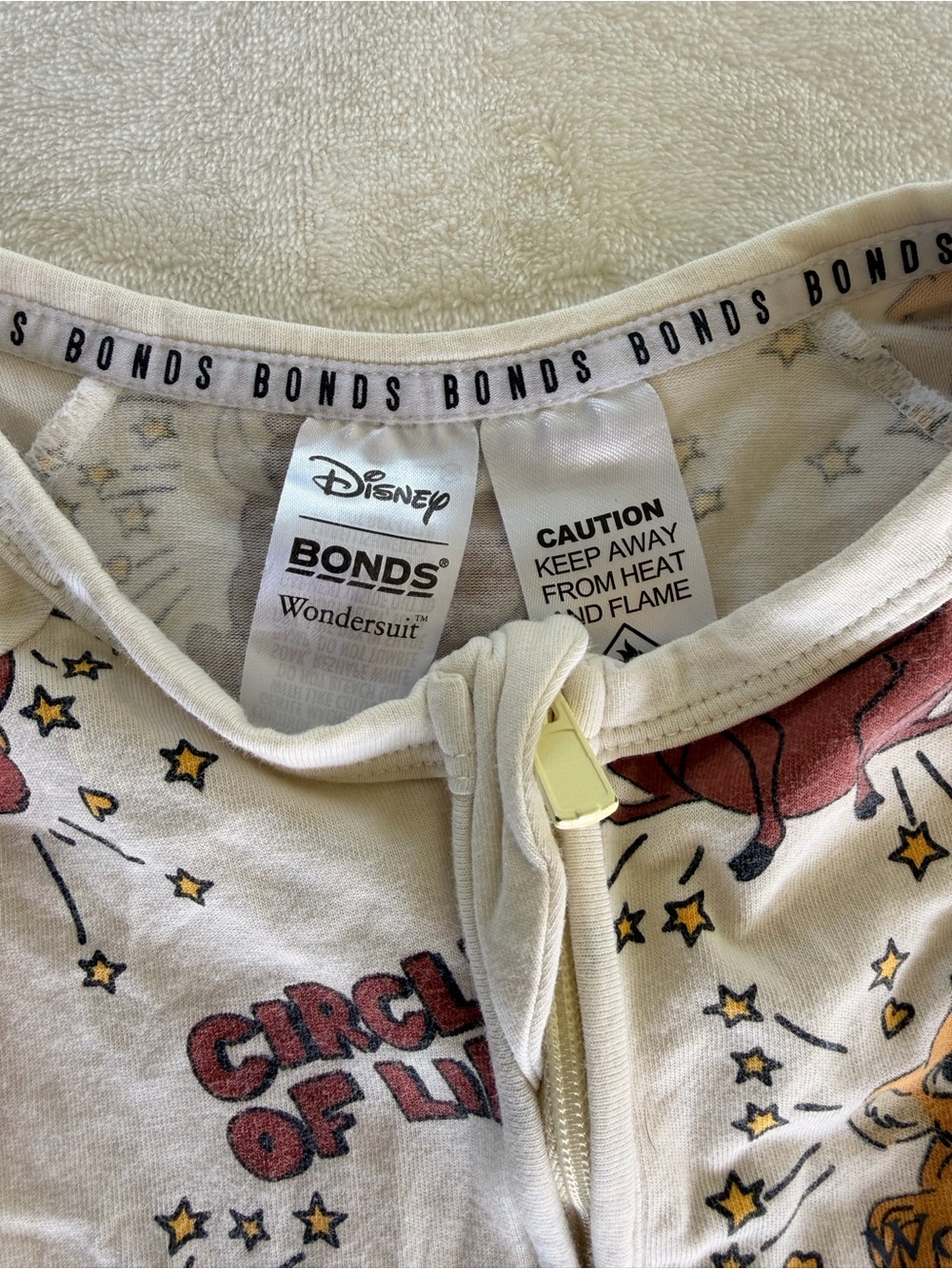 Bonds Disney's The Lion King Circle of Life Wondersuits in a beige color - Picture 4 of 6